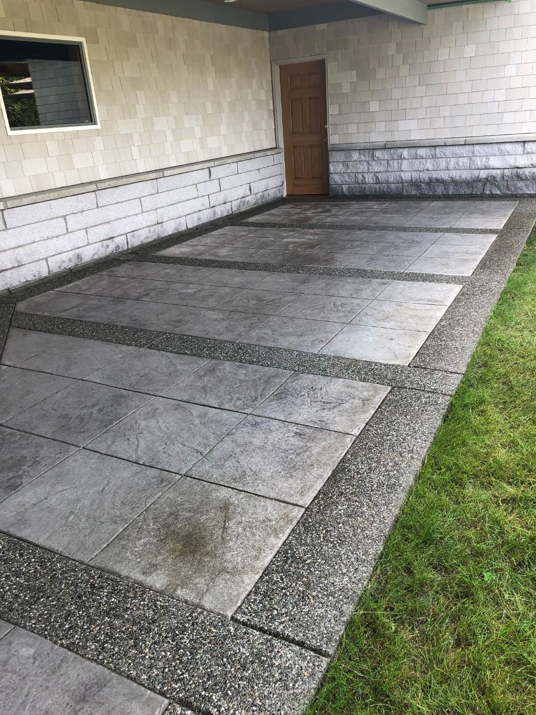 Stamped concrete with exposed aggregate bands