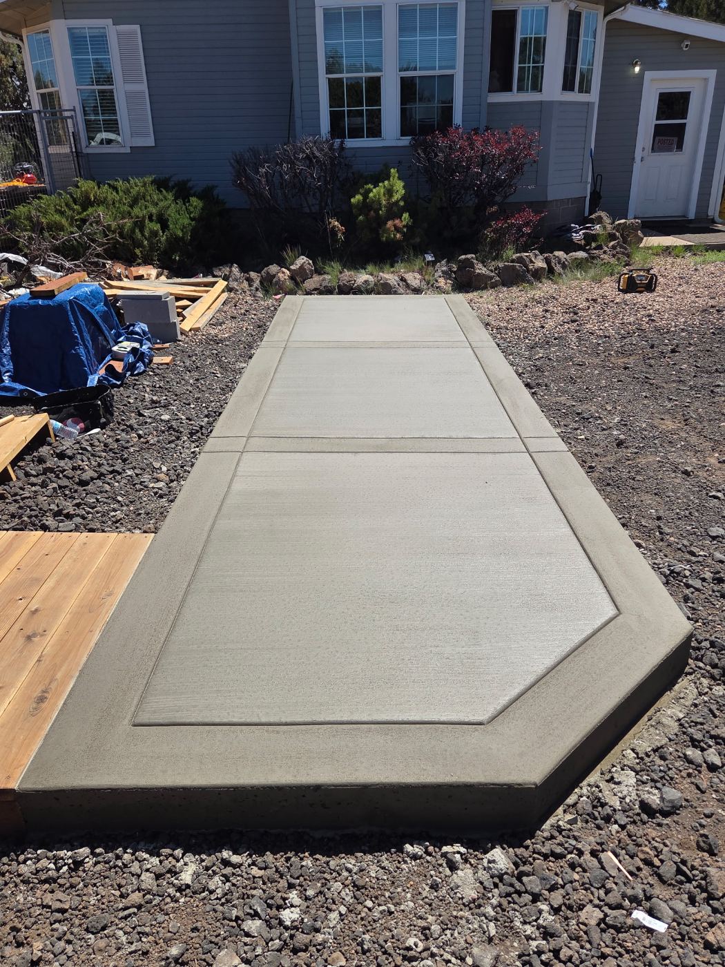 Finished concrete walkway with decorative border
