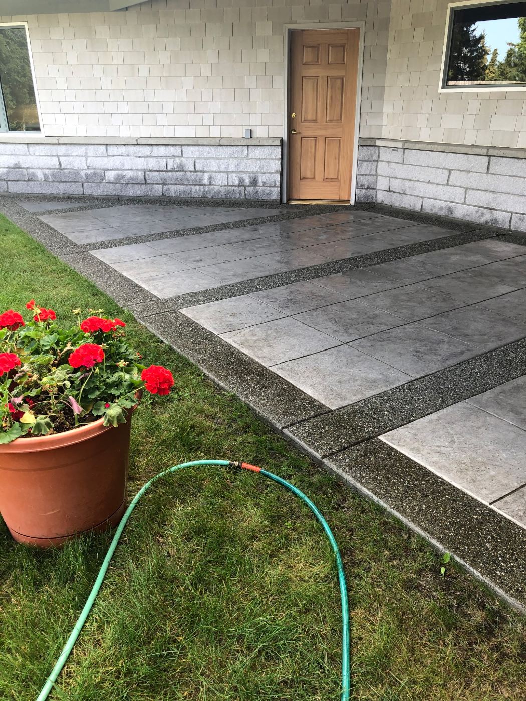 Stamped patio with aggregate border